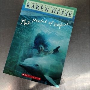The Music of Dolphins by: Karen Hesse, paperback book